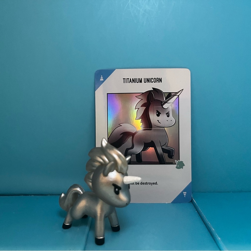 Unstable Unicorns Vinyl Figure - Excl. Titanium Unicorn with promo card (no box)